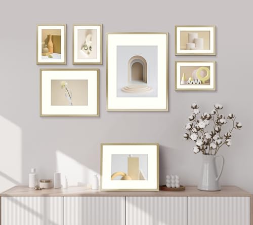 Frametory, Aluminum Picture Frames Set of 7 - Gold Gallery Wall Kit - Displays One 11x14, Two 8x10, and Four 5x7 inch Photos for Home Decoration Frametory