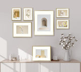 Frametory, Aluminum Picture Frames Set of 7 - Gold Gallery Wall Kit - Displays One 11x14, Two 8x10, and Four 5x7 inch Photos for Home Decoration Frametory
