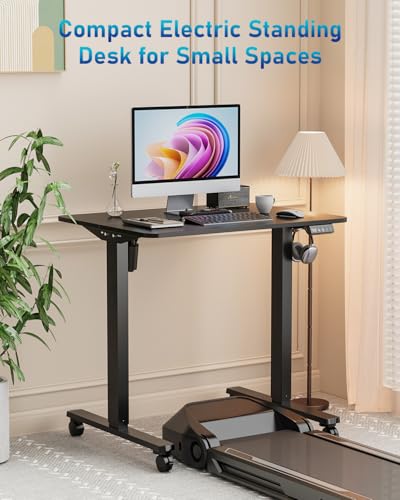 Xyndyx Small Height Adjustable Electric Standing Desk, 31.5" x 23.6" Sit Stand up Desk with Splice Board, Ergonomic Rising Computer Home Office Desk Table with Memory Preset, Black Frame/Black Top Xyndyx