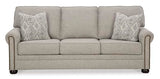 Signature Design by Ashley Gaelon Transitional Sofa with Nailheads and 2 Accent Pillows, Beige Signature Design by Ashley