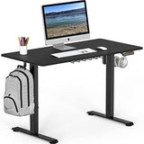 SHW Electric Height Adjustable Sit Stand Desk with Hanging Hooks and Cable Management, 48 x 24 Inches, Black Frame and Black Top SHW