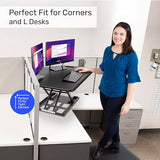 X-Elite Pro 40" Corner Standing Desk Converter with Pneumatic Lift | Adjustable Sit to Stand Riser, L-Shaped Desks & Cubicles | Fully Assembled Computer Workstation (Matte Black) Stand Steady