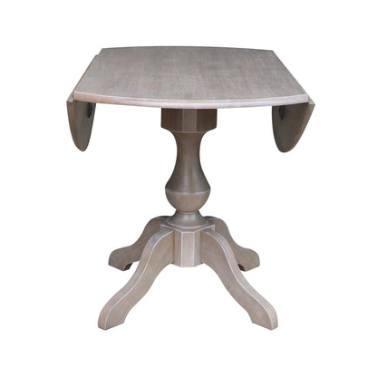 International Concepts 42" Round Dual Drop Leaf Pedestal Table-30.3" H Dining Table, Washed Gray Taupe - WoodArtSupply