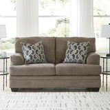 Signature Design by Ashley Stonemeade Casual Loveseat with 2 Toss Pillows, Dark Brown Signature Design by Ashley