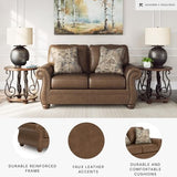 Signature Design by Ashley Shadsburne Rustic Faux Leather Loveseat with Nailhead Trim and 2 Throw Pillows, Brown Signature Design by Ashley