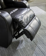 Signature Design by Ashley Caveman Den Modern Faux Leather Power Reclining Sofa with Adjustable Headrest, Drop Down Table, Electrical Outlets and LED Reading Lights, Black Signature Design by Ashley