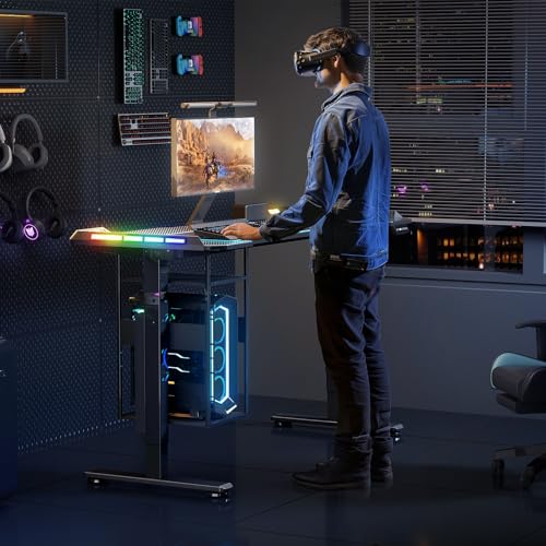 Gaming Standing Desk with LED Lights & Host Shelf, 55" x 24" Gaming Table with Music Sensing APP Control, Underdesk Cable Storage Electric Standing Desk, Black Carbon Fiber PC Table for Home Office Flycity