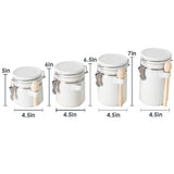 Canister Sets For The Kitchen (4 Piece Set) White, High Gloss Ceramic | By Home Basics | Decorative| With Wooden Spoons, Countertop Set For Flour, Sugar, Coffee, and Snacks Home Basics