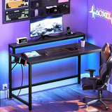 YATINEY 47.2" Computer Desk with Charging Station and LED Lights, Gaming Desk with Monitor Stand, 2-Tier Home Office Desk with 4 Side Hooks, for Living Room, Home Office, Black DN12UDBB YATINEY