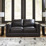 Signature Design by Ashley Amiata Modern Leather Match Loveseat with Non-skid Legs, Black Signature Design by Ashley
