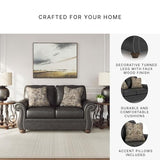 Signature Design by Ashley Chatterton Rustic Faux Leather Loveseat with Nailhead Trim and 2 Throw Pillows, Black Signature Design by Ashley