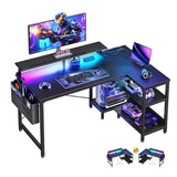 ODK 40 Inch Gaming Desk with USB Power Outlets and LED Lights, Reversible L Shaped Computer Desk with Storage Shelves & Monitor Stand, Corner Home Office Desk Table, Carbon Fiber Surface, Black ODK