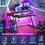 Korfile 40 Inch Gaming Desk with Power Outlet & LED Lights, L Shaped Computer Gaming Table with 3 Tiers Storage Shelves, Corner Gamer Desk with Monitor Stand for Small Space, Carbon Fiber Black Korfile