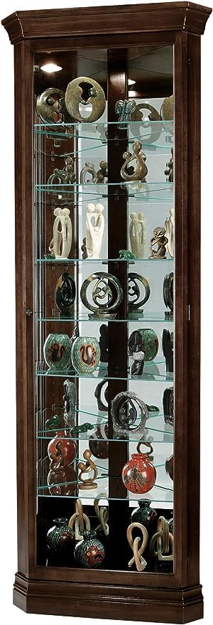 Howard Miller Cornell Corner Curio Cabinet - Showcase Legacy Finish Adjustable Shelves & Adjustable Levelers Illuminated Interior Lightning Perfect for Living Room Office and Room Decor Howard Miller