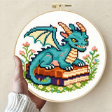 Zhenqing Cute Dragon on Books Cross Stitch Kit, 11CT Printed 24x24cm with Hoop, Fantasy Embroidery Set for Beginners (70976)