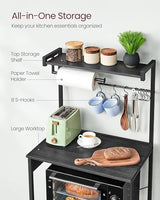 VASAGLE Kitchen Bakers Rack with Power Outlet, Coffee Bar 4-Tier with 8 S Hooks, Microwave Stand, Adjustable Shelf, for Small Spaces, Charcoal Gray and Ink Black UKKS014B01V1