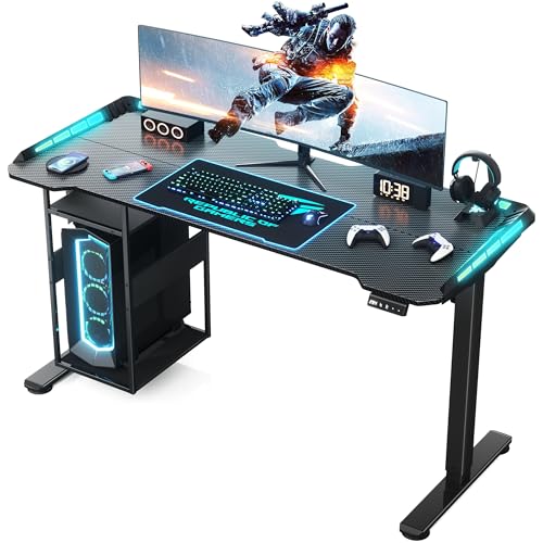 Gaming Standing Desk with LED Lights & Host Shelf, 55" x 24" Gaming Table with Music Sensing APP Control, Underdesk Cable Storage Electric Standing Desk, Black Carbon Fiber PC Table for Home Office Flycity