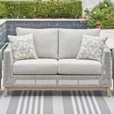 Signature Design by Ashley Seton Creek Cottage Weather Resistant Outdoor Loveseat with Cushion and 2 Throw Pillows, Light Brown & Light Gray Signature Design by Ashley