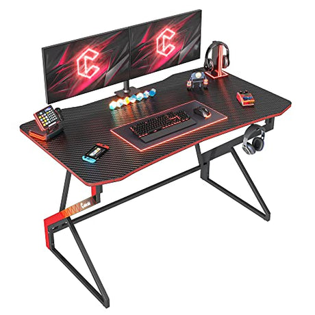 CubiCubi Simple Gaming Desk Z Shaped 47 inch Gamer Workstation, Home Computer Carbon Fiber Surface Gaming Desk PC Table with Headphone Hook CubiCubi