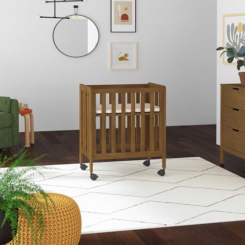 DaVinci Carter's Colby Grow 6-in-1 Convertible Bassinet to Crib in Walnut, GREENGUARD Gold Certified, Removable Wheels