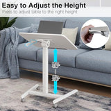 PUNCIA 90°Tiltable Small Standing Desk with Stoppers Mobile Rolling Laptop Table on Wheels Pneumatic Adjustable Height Computer Workstation Stand Up Cart Bedside Overbed Table for Home Office White PUNCIA