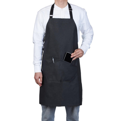 Restaurantware 32 x 26 Inch Cooking Apron 1 Flame Retardant Chef Apron - Adjustable Neck Straps For Men And Women Black Cotton Kitchen Apron Grill Bake Or Paint Durable Restaurantware