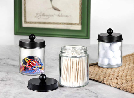 Amolliar 4 Pack Apothecary Jars Bathroom Vanity Storage Organizer Set -Countertop Canister with Stainless Steel Lids &Cute Stickers - Qtip Dispenser Holder for Qtips,Cotton Swabs,Makeup Sponges(Black) Amolliar