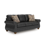 Signature Design by Ashley Chatterton Rustic Faux Leather Sofa with Nailhead Trim and 2 Throw Pillows, Black Signature Design by Ashley