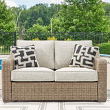 Signature Design by Ashley Beachcroft Casual Weather Resistant Resin Wicker Outdoor Loveseat with Cushion and 2 Accent Pillows, Dark Brown & Beige Signature Design by Ashley