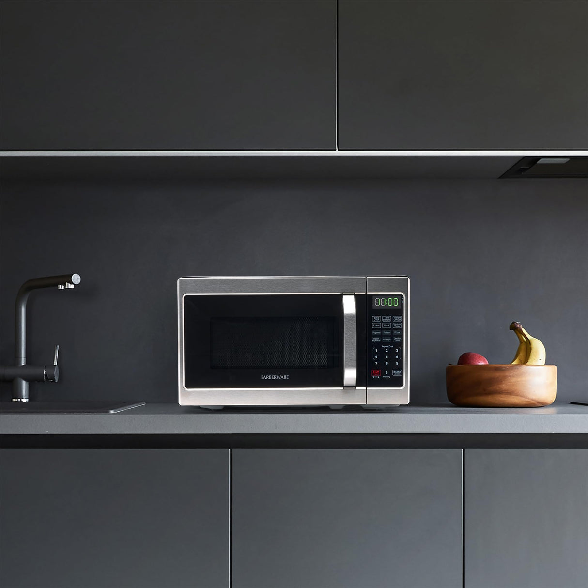 Farberware Countertop Microwave 700 Watts, 0.7 Cu. Ft. - Microwave Oven With LED Lighting and Child Lock - Perfect for Apartments and Dorms - Easy Clean Stainless Steel Farberware