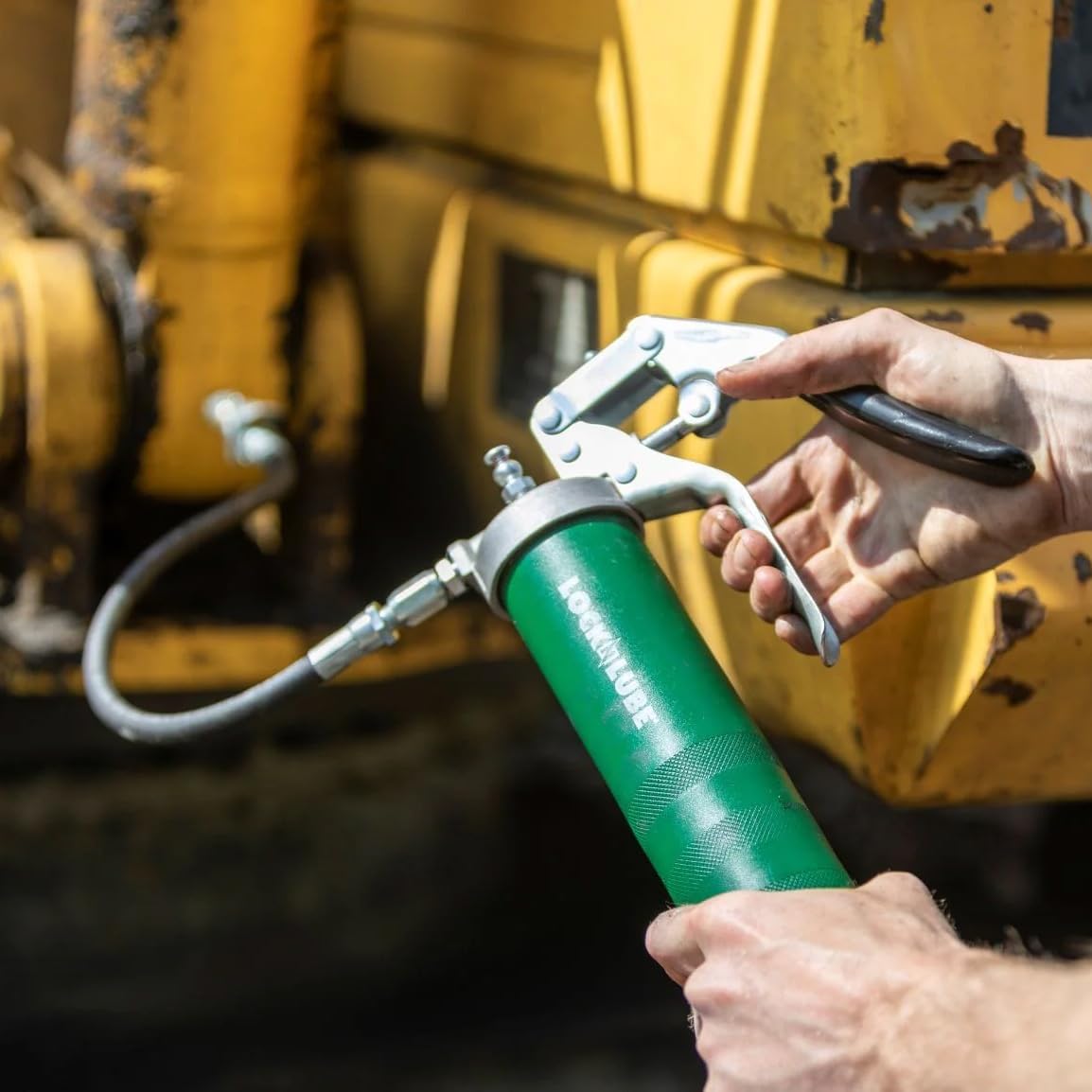 LockNLube Heavy-Duty Pistol Grip Grease Gun. Includes our patented LockNLube® Grease Coupler (Locks On, Stays On, Won't Leak!) plus a high-quality 20" hose and in-line hose swivel - WoodArtSupply