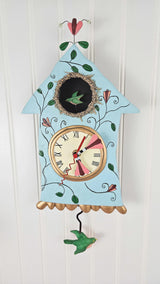 Enesco Allen Designs Birdhouse with Flowers Cuckoo Wall Clock - Battery Operated Pendulum Analog Clock, Stone Resin Decorative Clocks for Walls Home Decor Kitchen Clocks, 14.9 Inch Enesco