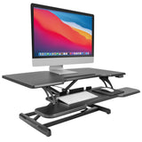 Mount-It! Electric Standing Desk Converter with 38" Tabletop, Height Adjustable Sit Stand Desk Riser, Motorized Desk Riser with Keyboard Tray and Device Slot, Fits Monitor & Laptop, Black Mount-It!