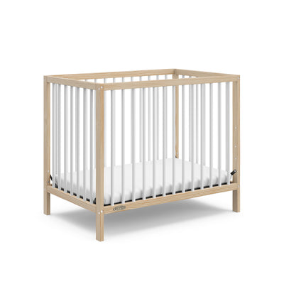 Graco Teddi 4-in-1 Convertible Mini Crib with Bonus Water-Resistant Mattress (Natural with White) – GREENGUARD Gold Certified, 2.75-Inch Mattress Included, Convenient Size, Easy 30-Minute Assembly