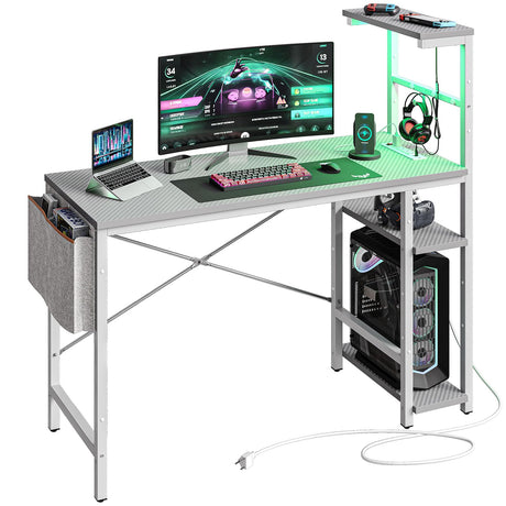 Bestier Gaming Desk with Power Outlets, 44 Inch Led Gamer Desk with 4 Tiers Reversible Shelves, PC Gaming Table with Headset Hook & Side Storage Bag for Bedroom (Grey 3D Carbon Fiber) Bestier