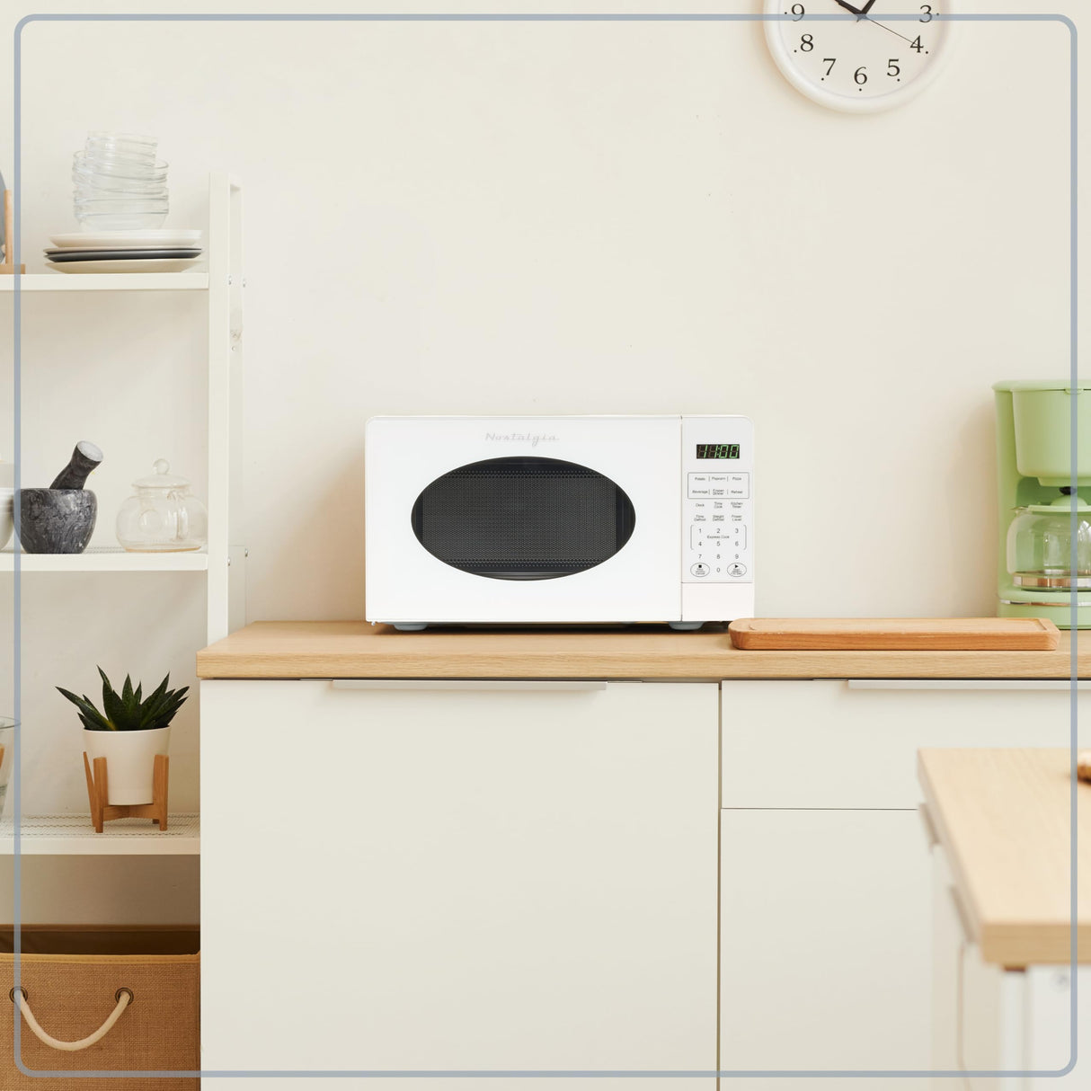 Nostalgia Modern Retro Countertop Microwave Oven - 700-Watt - 0.7 cu ft - 12 Pre-Programmed Cooking Settings - Digital Clock - Kitchen Appliances - White Nostalgia
