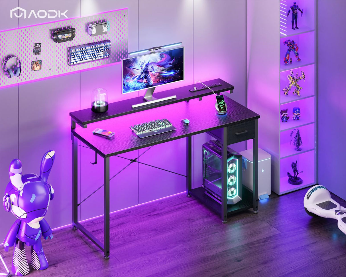 AODK Gaming Desk with LED Lights & Power Outlet, 48 Inch Computer Desk with Drawer, Reversible Desk with Adjustable Monitor Shelf & Headphone Hook for Home Office, Black AODK