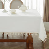 Alsoo Table Cloth Rectangle Table Heavy Duty Cotton Linen Texture Tablecloth Farmhouse Waterproof Wrinkle Free Table Cover with Ivory Tassel for Kitchen Dining Holiday Party, Ivory, 55" x 75" Alsoo
