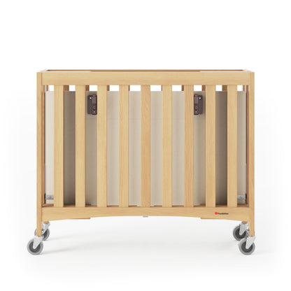 Foundations Travel Sleeper Compact Wooden Folding Crib, Portable Baby Crib with 2” InfaPure Foam Crib Mattress and Commercial Grade Casters, Hotel Crib (Natural) - WoodArtSupply