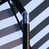 Sunnyglade 9' Solar 24 LED Lighted Umbrella with 8 Ribs Adjustment and Crank Lift System for Patio - Black and White Sunnyglade