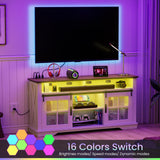 HAIOOU 63" Farmhouse TV Stand with LED Light & Power Outlets for TVs up to 70 Inches, 31.5" High Tallboy TV Console Stand Entertainment Center with Cross Design Sliding Barn Doors - White HAIOOU