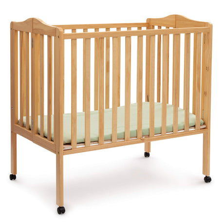 Delta Children Folding Portable Mini Baby Crib with 1.5-inch Mattress - Greenguard Gold Certified, Natural Delta Children