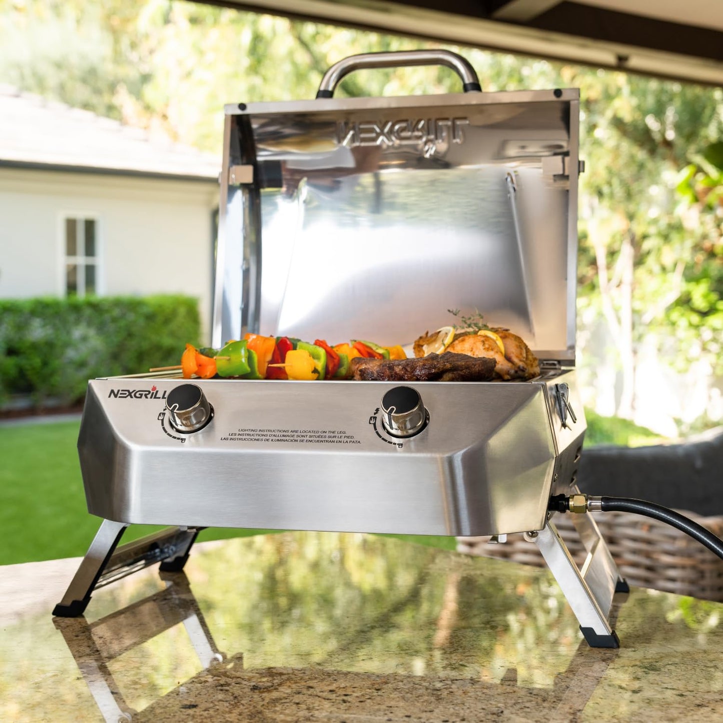 Nexgrill Stainless Steel 2-Burner Portable Gas Grill with Locking Lid, Folding Legs, 20,000 BTUs, 251 SQ In Cooking Space, Tabletop Grill for Camping, Outdoor Cooking, Patios, and More - 820-0007GE