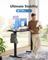 HUANUO Electric Standing Desk, 48" x 24" Whole Piece Desktop, Adjustable Height Computer Desk, 4 Height Memory Settings, Sit Stand Up Desk for Home Office, Black HUANUO