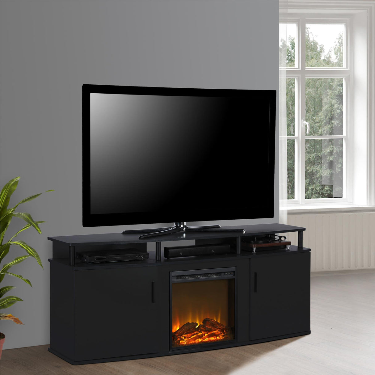 Ameriwood Home Carson Fireplace TV Stand for TVs up to 70 Inch, Replaceable Electric Fireplace Insert Heater, Realistic Log and Flame Effect, For Living Room or Bedroom, Black Ameriwood Home