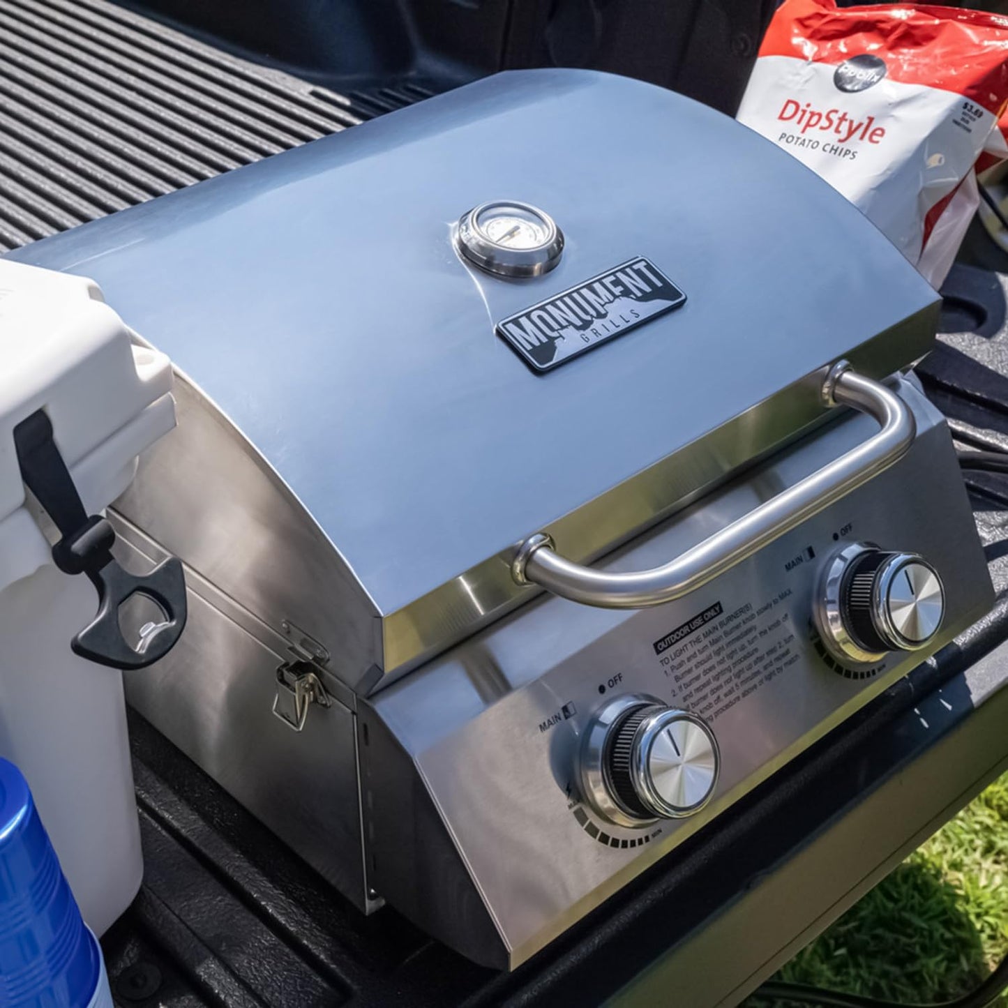 Monument Grills Tabletop Propane Gas Grill for Outdoor Portable Camping Cooking with Travel Locks, Stainless Steel High Lid, and Built in Thermometer