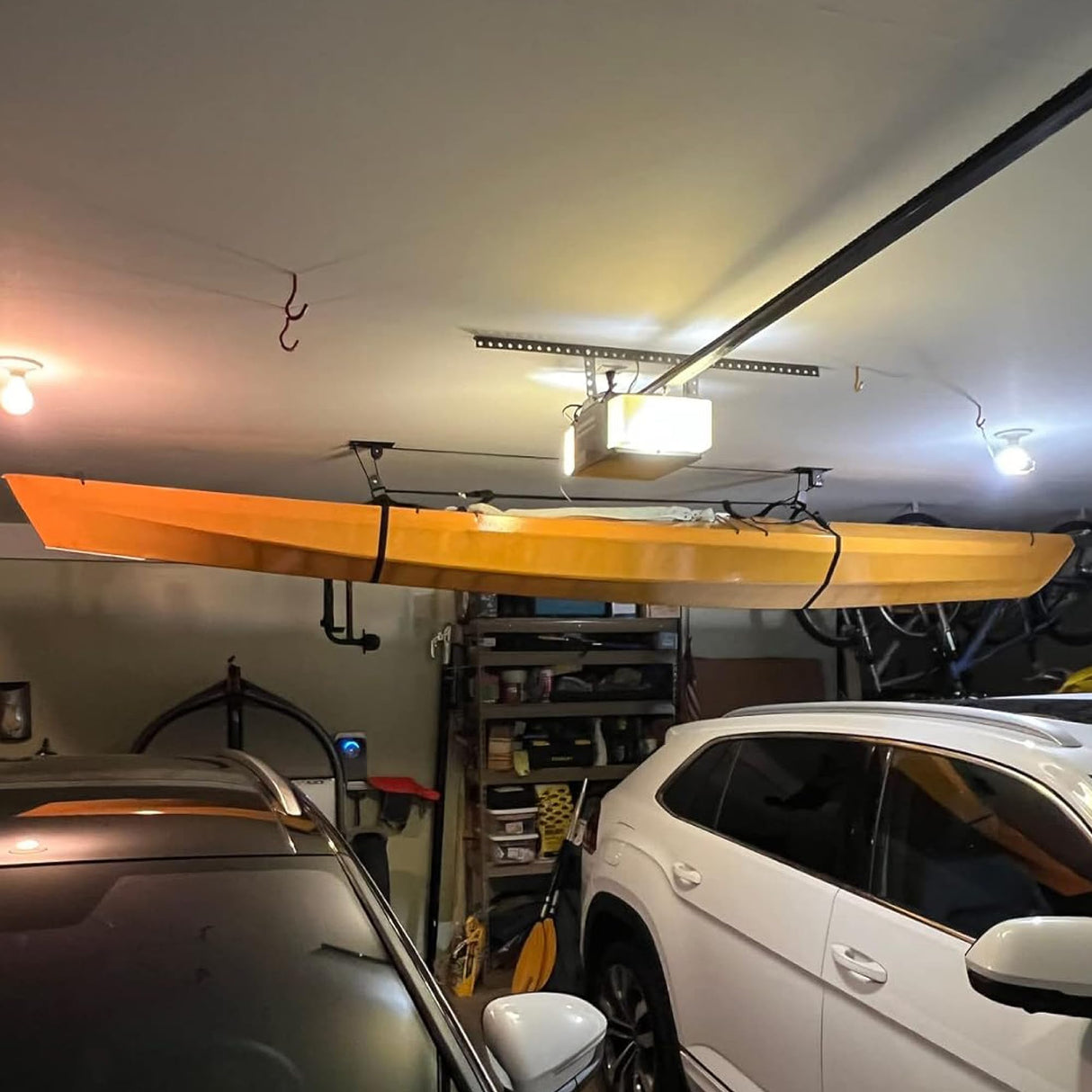 StoreYourBoard Kayak and Canoe Ceiling Hoist – Overhead Garage Storage Rack for Kayaks, Canoes, and Paddle Gear – Heavy Duty Pulley System Indoor Ceiling Mount – Holds 150 lbs, 10 to 14 ft High Spaces StoreYourBoard