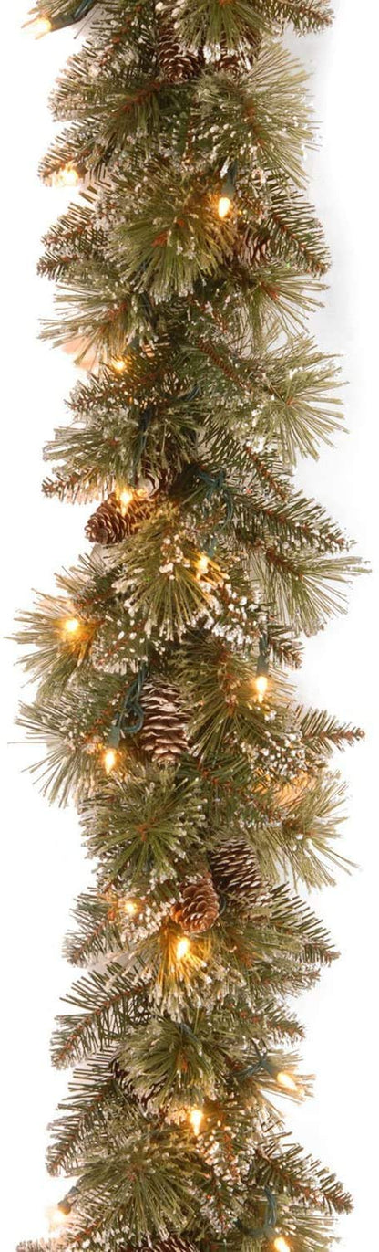 National Tree Company Pre-Lit Artificial Christmas Garland, Green, Glittery Bristle Pine, White Lights, Decorated with Pine Cones, Battery Operated, Christmas Collection, 6 Feet