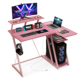 Tangkula L Shaped Gaming Desk with Power Outlets, Small Gaming Computer Desk 39inch with Storage Shelf, Corner Desk with Carbon Fiber Texture, Gamer Desk Gaming Table (Pink) Tangkula