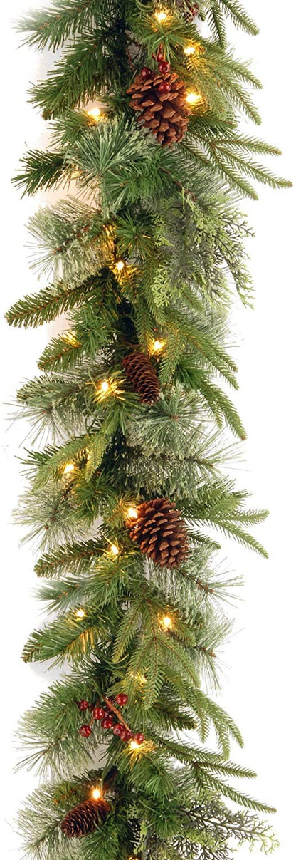 National Tree Company Pre-Lit 'Feel Real' Artificial Christmas Garland, Green, Colonial Fir, White Lights, Decorated With Pine Cones, Plug In, Christmas Collection, 9 Feet